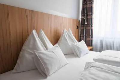 Ein Bett oder Betten in einem Zimmer der Unterkunft Pension Dr. Geissler
