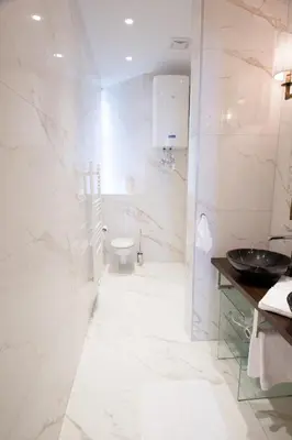Ein Badezimmer in der Unterkunft Studio Apartments Urania - Mai's Apartments