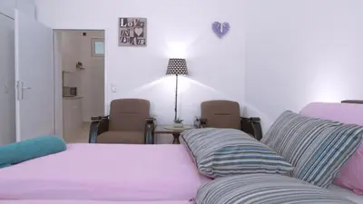 Ein Bett oder Betten in einem Zimmer der Unterkunft Donkey