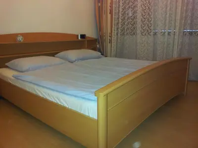 Ein Bett oder Betten in einem Zimmer der Unterkunft Apartment City-Center