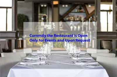 Ein Restaurant oder anderes Speiselokal in der Unterkunft River Lodge