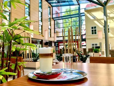 Ein Restaurant oder anderes Speiselokal in der Unterkunft JUFA Hotel Wien City