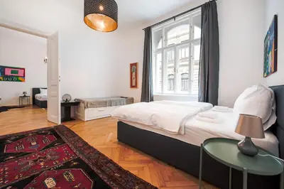 Ein Bett oder Betten in einem Zimmer der Unterkunft GRAND SOHO II Apartment Vienna