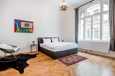 Ein Bett oder Betten in einem Zimmer der Unterkunft GRAND SOHO II Apartment Vienna