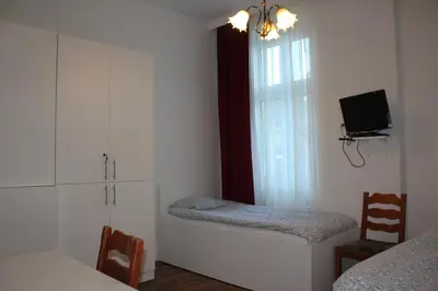 Ein Bett oder Betten in einem Zimmer der Unterkunft Arnes Hotel Vienna