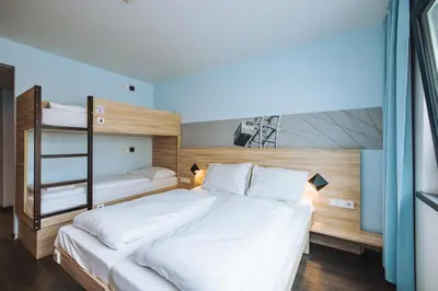 Ein Bett oder Betten in einem Zimmer der Unterkunft MEININGER Hotel Wien Downtown Franz