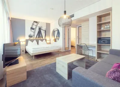 Ein Bett oder Betten in einem Zimmer der Unterkunft roomz hotel & conference center vienna prater