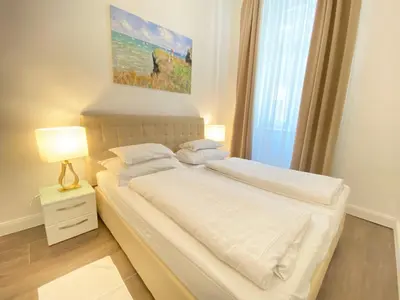 Ein Bett oder Betten in einem Zimmer der Unterkunft Steiner Residences Vienna Taborstrasse