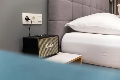 Ein Bett oder Betten in einem Zimmer der Unterkunft The Parcels Hotel - Adults Only