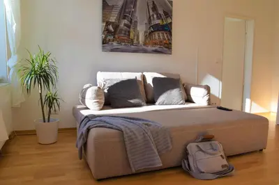 Ein Bett oder Betten in einem Zimmer der Unterkunft Belvedere Apartment