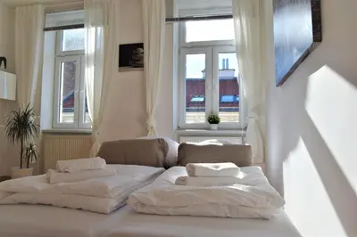 Ein Bett oder Betten in einem Zimmer der Unterkunft Belvedere Apartment