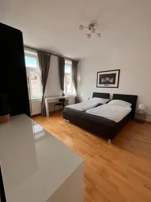 Ein Bett oder Betten in einem Zimmer der Unterkunft Belvedere Apartment
