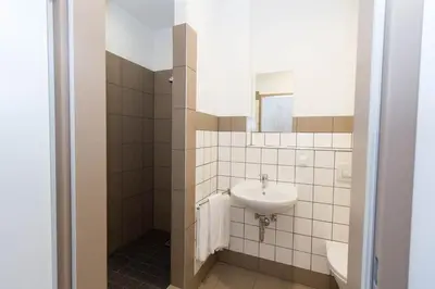 Ein Badezimmer in der Unterkunft WinBudget 