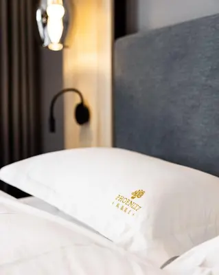 Ein Bett oder Betten in einem Zimmer der Unterkunft Phoenix7