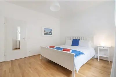 Ein Bett oder Betten in einem Zimmer der Unterkunft Apartment France | Operastreet