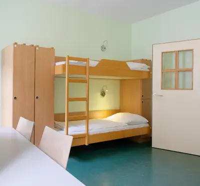 Ein Bett oder Betten in einem Zimmer der Unterkunft Jugendherberge Wien - Myrthengasse