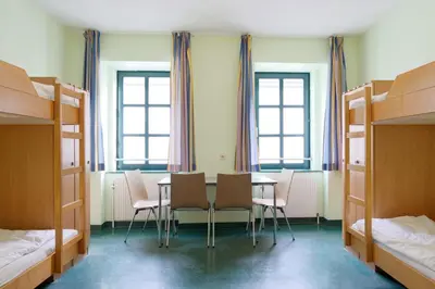 Ein Bett oder Betten in einem Zimmer der Unterkunft Jugendherberge Wien - Myrthengasse