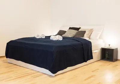 Ein Bett oder Betten in einem Zimmer der Unterkunft Viennese Prater Residence