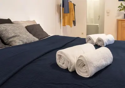 Ein Bett oder Betten in einem Zimmer der Unterkunft Viennese Prater Residence