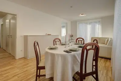 Ein Sitzbereich in der Unterkunft Carin Deluxe II
