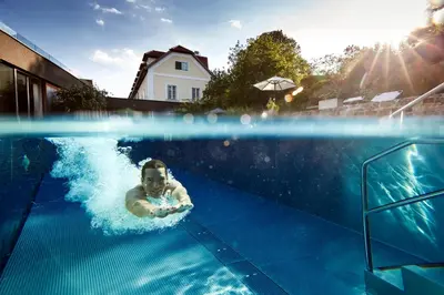 Der Swimmingpool an oder in der Nähe von Hotel Landhaus Moserhof