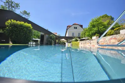 Der Swimmingpool an oder in der Nähe von Hotel Landhaus Moserhof