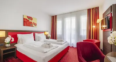 Ein Bett oder Betten in einem Zimmer der Unterkunft PLAZA INN Amedia Wien