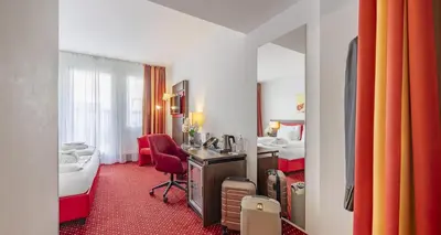 Ein Sitzbereich in der Unterkunft PLAZA INN Amedia Wien