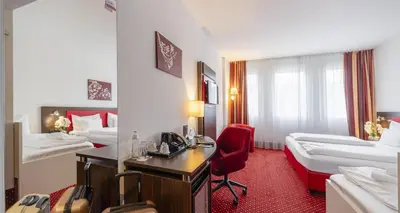 Ein Bett oder Betten in einem Zimmer der Unterkunft PLAZA INN Amedia Wien