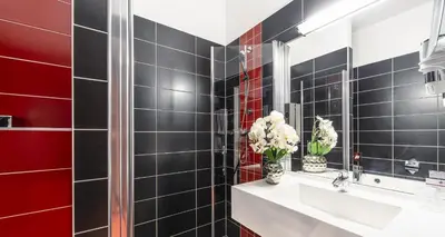 Ein Badezimmer in der Unterkunft PLAZA INN Amedia Wien