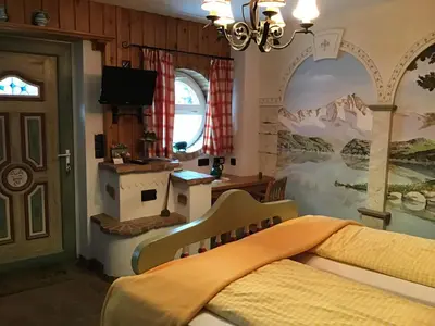 Ein Bett oder Betten in einem Zimmer der Unterkunft Pension Haus Sanz