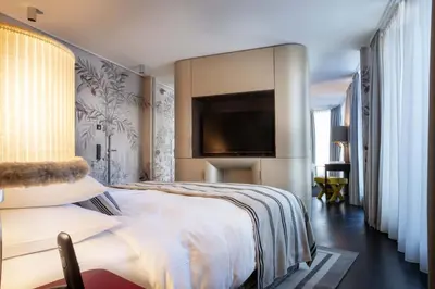 Ein Bett oder Betten in einem Zimmer der Unterkunft Hotel Topazz & Lamée