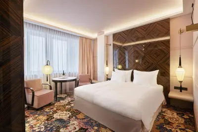 Ein Bett oder Betten in einem Zimmer der Unterkunft Hotel Topazz & Lamée