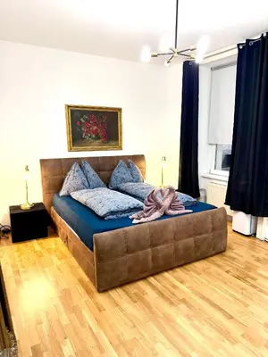 Ein Bett oder Betten in einem Zimmer der Unterkunft City center Apartment