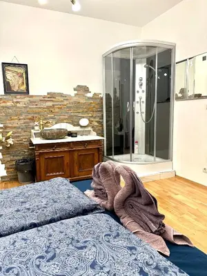 Ein Bett oder Betten in einem Zimmer der Unterkunft City center Apartment