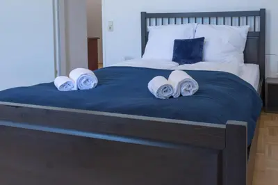 Ein Bett oder Betten in einem Zimmer der Unterkunft Kingsize Central Station Residence