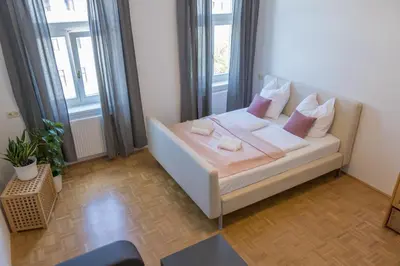 Ein Bett oder Betten in einem Zimmer der Unterkunft Kingsize Central Station Residence