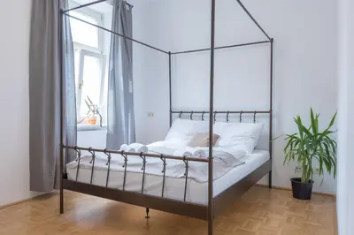 Ein Bett oder Betten in einem Zimmer der Unterkunft Kingsize Central Station Residence