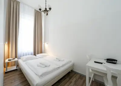 Ein Bett oder Betten in einem Zimmer der Unterkunft Timeout City Hotel, 5 min to city center, Self Check In