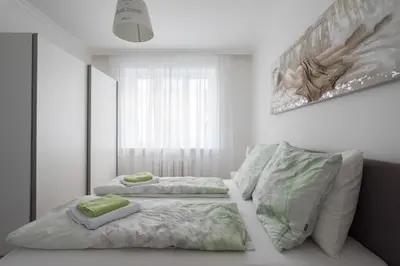 Ein Bett oder Betten in einem Zimmer der Unterkunft Let it be Vienna U1, U2, U4 Karlsplatz Oper
