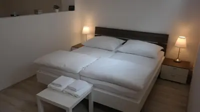 Ein Bett oder Betten in einem Zimmer der Unterkunft Antonio Appartement