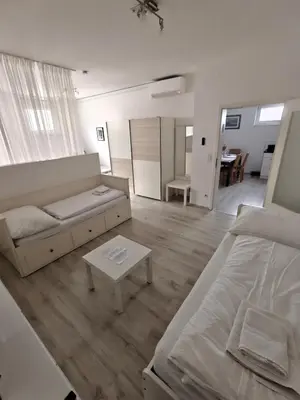 Ein Bett oder Betten in einem Zimmer der Unterkunft Antonio Appartement