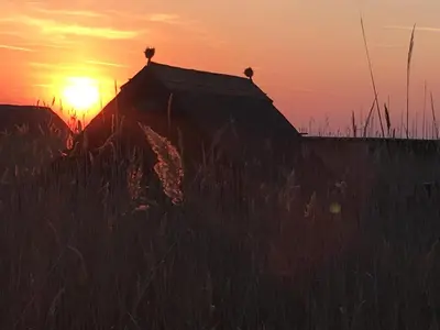 Blick auf den Sonnenuntergang/Sonnenaufgang von des Ferienhauses aus oder aus der Nähe