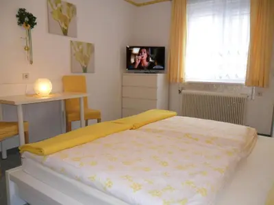 Ein Bett oder Betten in einem Zimmer der Unterkunft Pension Hendling