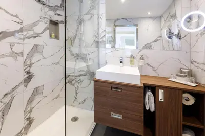 Ein Badezimmer in der Unterkunft Hotel Royal