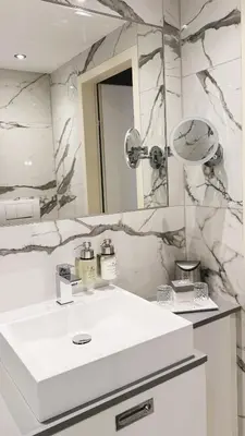 Ein Badezimmer in der Unterkunft Hotel Regina