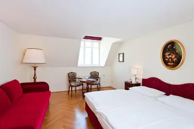 Ein Bett oder Betten in einem Zimmer der Unterkunft Hotel Regina