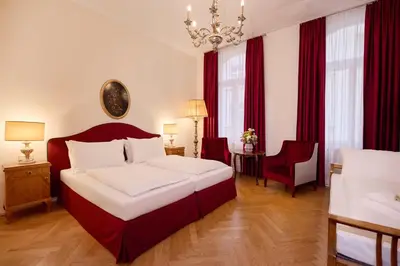 Ein Bett oder Betten in einem Zimmer der Unterkunft Graben Hotel