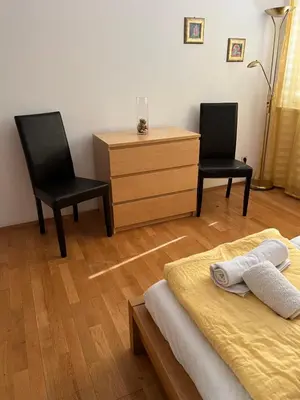 Ein Bett oder Betten in einem Zimmer der Unterkunft Stelius Wien