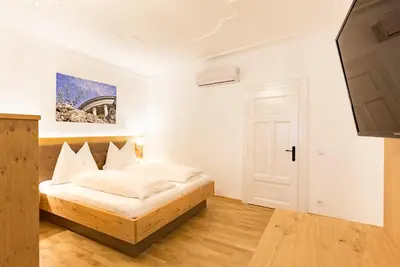 Ein Bett oder Betten in einem Zimmer der Unterkunft Altes Backhaus